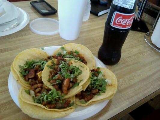 Cinqo taquitos al pastor, and a Mexican Coca-Cola