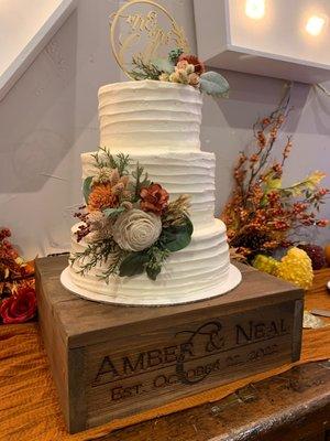 Lemon raspberry filled rustic style wedding cake- so good! We can't wait to have the top tier for our 1 year anniversary!!