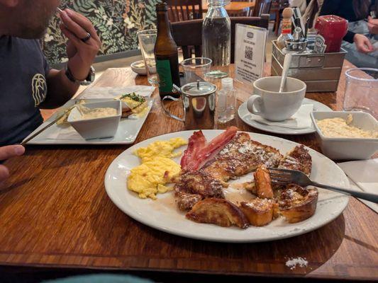 2-2-2 French toast, scrambled eggs, bacon and side of grits.