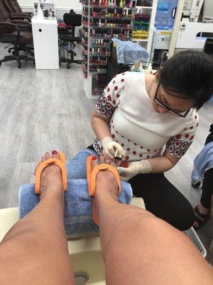 Lovely woman taking care of my feet!