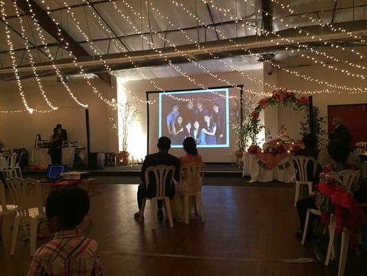 Happy couple enjoying the slide show