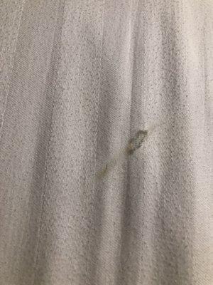 Hole in the fitted sheet. Also badly pilled.