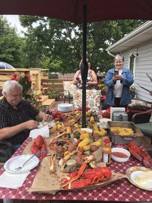 Fresh Lobster Crab Clams Potatoes Corn Onion Boil