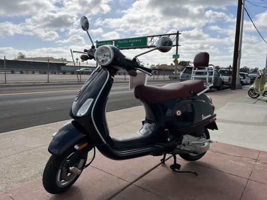 Vespa's classic design. Is this scooter new or 20-years old?