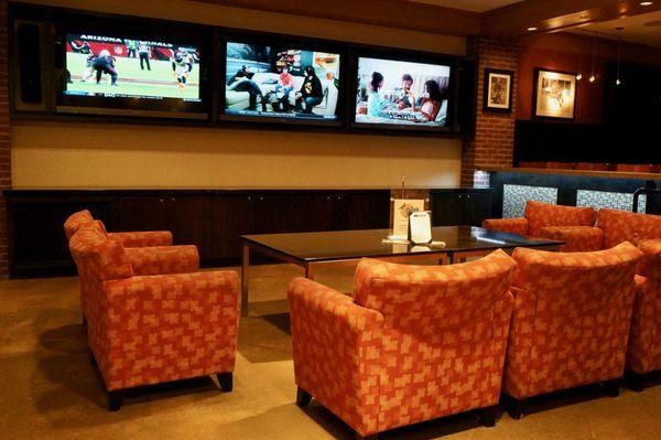 Lounge seating with tons of TVs!