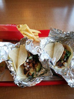 #8 combo. 2 chicken tacos and some fries . Pretty good for a fast food restaurant. Friendly staff