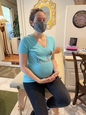 Me at a prenatal appointment, showing off their awesome shirt!