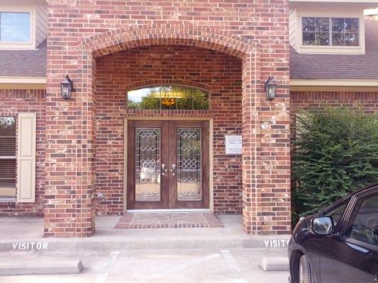 parking lot in rear of office at 717 W. Main Street, Midlothian, Texas