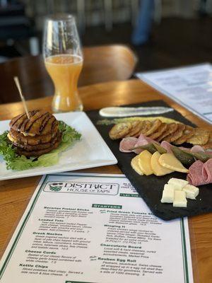 Fried green tomato stack and charcuterie board