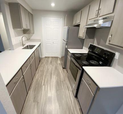 Newly Renovated Apartments, Stainless Steel Appliances, White Marble, Lots of Cabinets!