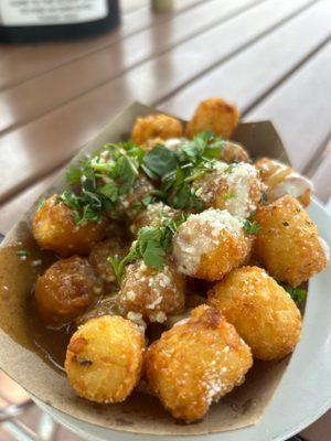 Lp's tots. Gravy, Queso, cotija  All the good stuff is on the bottom