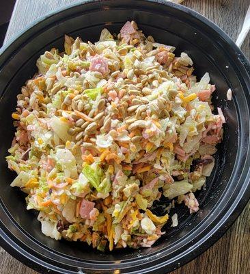 Create-your-own salad with iceberg lettuce, ham, feta and ranch dressing