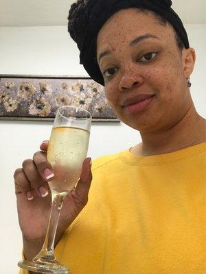 Complimentary glass of champagne while I wait for my wax and makeup appointment