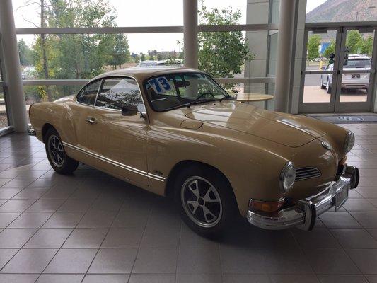 Classic Karmann Ghia in the showroom...makes me thirsty for some lemonade!