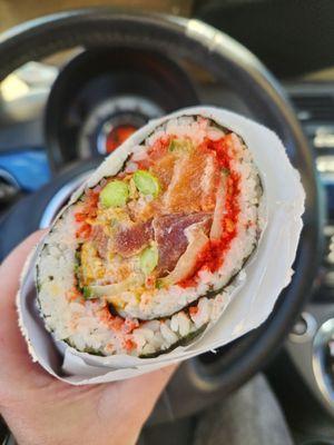 Inside of sushi burrito with hot cheetos!