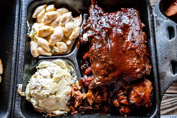 Pasta Salad, Potatoe Salad, and baby-back ribs, and chopped brisket.