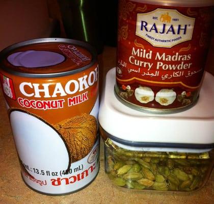 A few things I got here.  Coconut milk, Madras Curry powder and green cardamon pods.