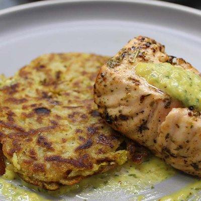 Salmon with potato latke topped with mustard herb sauce