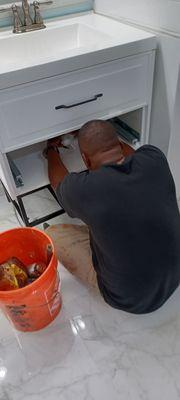 Aug 2023-Vanity installation: reworking the plumbing so it lines up with the drawers