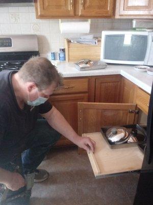 Pull out cabinets-- no more looking in the back with a flashlight for your pots and pans!