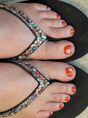 Completed pedicure with nail design. Love it!