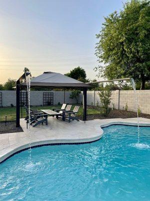 Floating fire pit and water feature Runnels and travertine