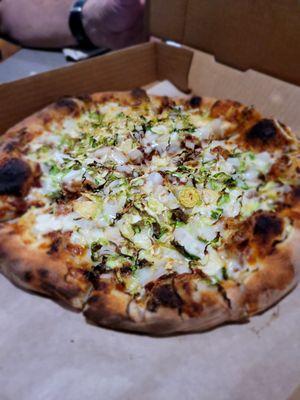 Shaved Brussels & onions to-go.  Heats up beautifully in our home pizza oven. Purchased for next day.