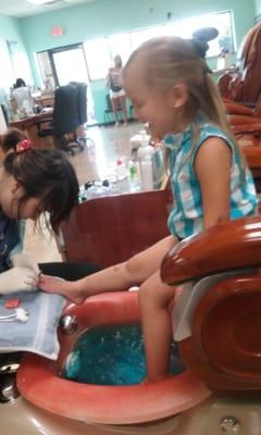 Loving her first pedicure!!