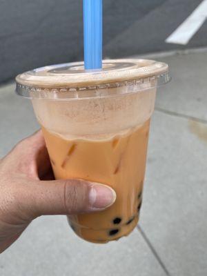 Thai iced tea with boba.