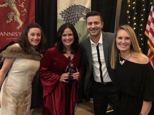 From left to right, associates Kelly Hanlon, Nicole Tingvall (receiving Whatcom Rookie of the Year honors), Paul Balzotti, Kate Fadden