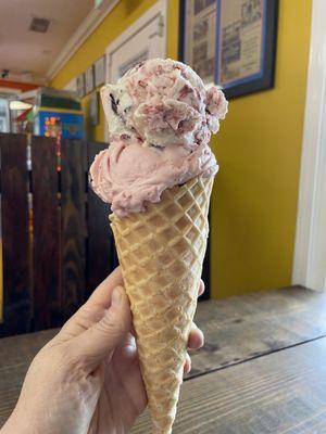 Waffle cone with 2 scoops -- cone properly filled with ice cream