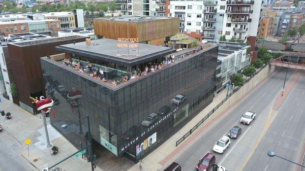 A summer evening enjoying live music on MCA Denver's rooftop patio