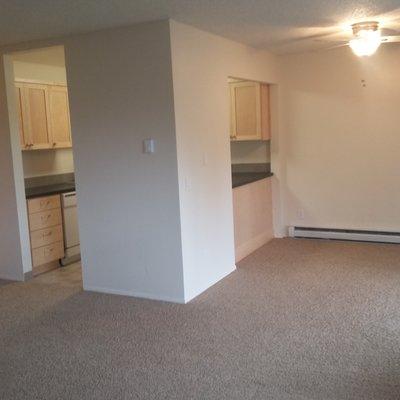 Living room looking at kitchen and dining