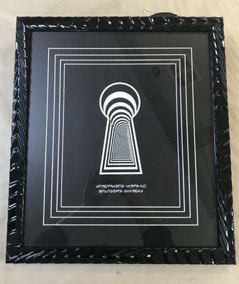 Album artwork framed for a Christmas gift! It's one matboard with three v-grooves and one regular bevel.