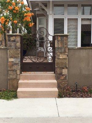 Pedestrian gate with scroll work