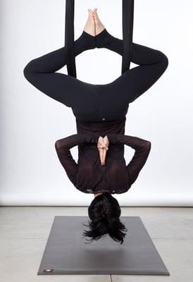 Inverted baddha konasana with namaskar hands