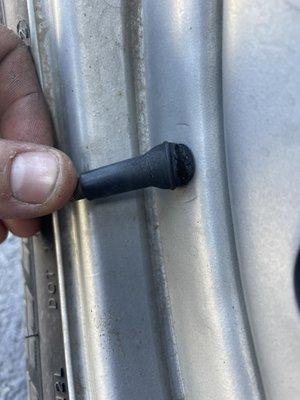 Bad valve stem on passenger side front tire ready to blow out.