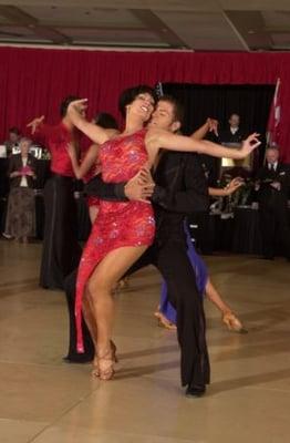 Taylor and Jennifer dancing professionally in the American Rhythm Division,