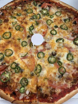 16 inch thin  crust Mexican Pizza pie cut slices