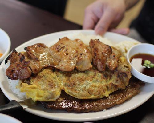 Combo plate of teriyaki chicken, meat junand galbi. All delicious!