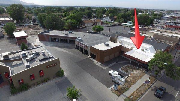 The red arrow is where the drive through is for the dry cleaners. The front doors face State Street.