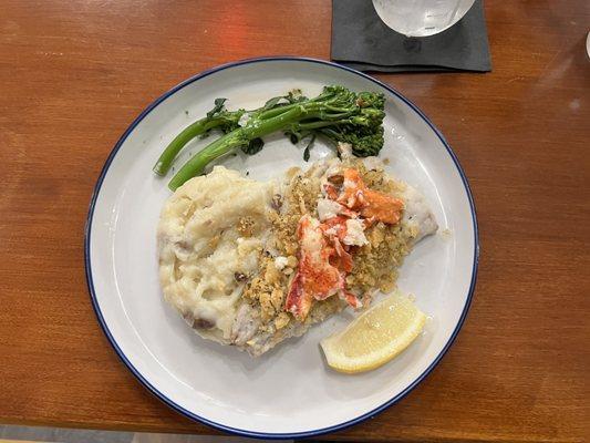 Broiled haddock with lobster bits on top