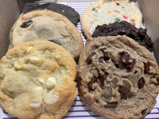 Classic 6: Left Classic chocolate chip, double chocolate and white macadamia  Right: birthday cake, double chocolate, chocolate chip