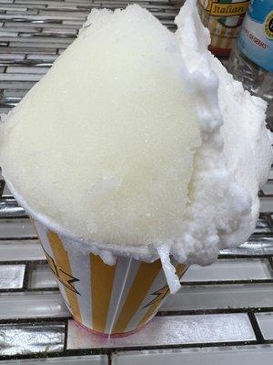 Here Comes Summer! 1/2 Lemon 1/2 Coconut with Real Coconut Authentic Italian Ice DELICIOUS! Check in with Yelp for 10% off Medium