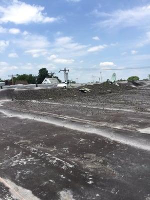 Same roof!! Pic taken July 20, 2016... Mounds of slag.