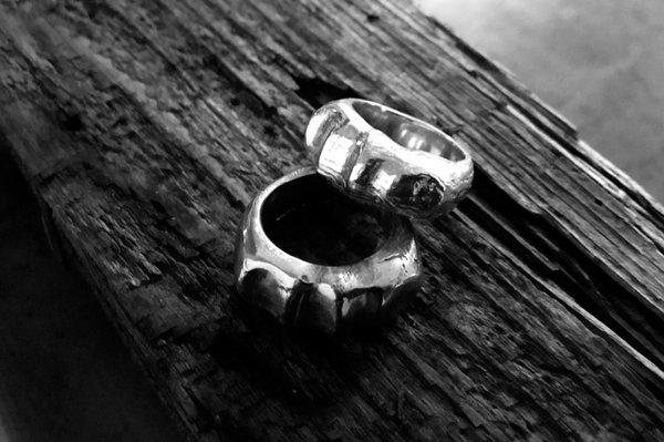 The designer michael hope has designed this ring out of solid oak then its cast in solid sterling silver...