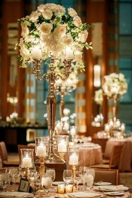 candlabras with flowers white wedding centerpieces