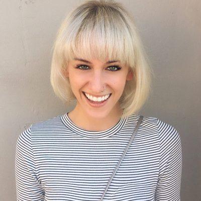 Going for a glam look? This blonde bob is perfect cut and color to frame a face bring. Color by Amanda