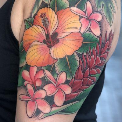 Hawaiian floral Tattoo done by Tommy Tingle at Mid-Pacific Tattoo In Bonita Springs Florida