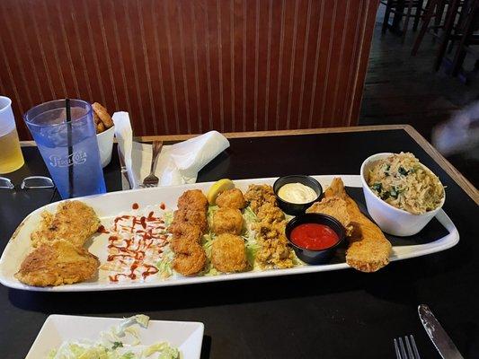 Seafood platter for 2 crab cakes, big fried shrimp, big fried scallops, fried oysters, and fried fish